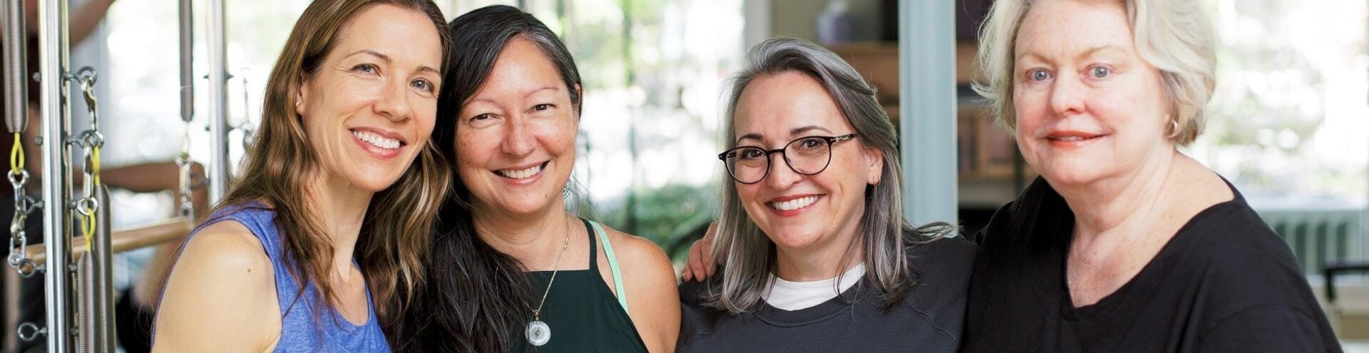 Two women smiling for a picture together.