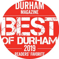 A red and white badge that says best of durham 2 0 1 9 readers ' favorite.